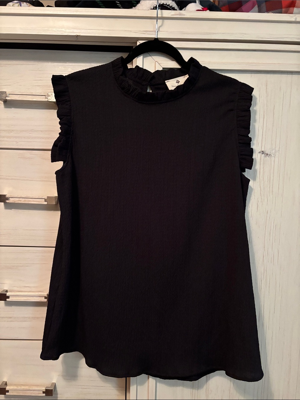 Women’s Black Ruffle-Trim Sleeveless Blouse